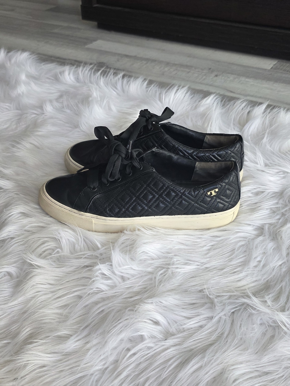 Tory Burch Quilted Leather Sneakers in Black